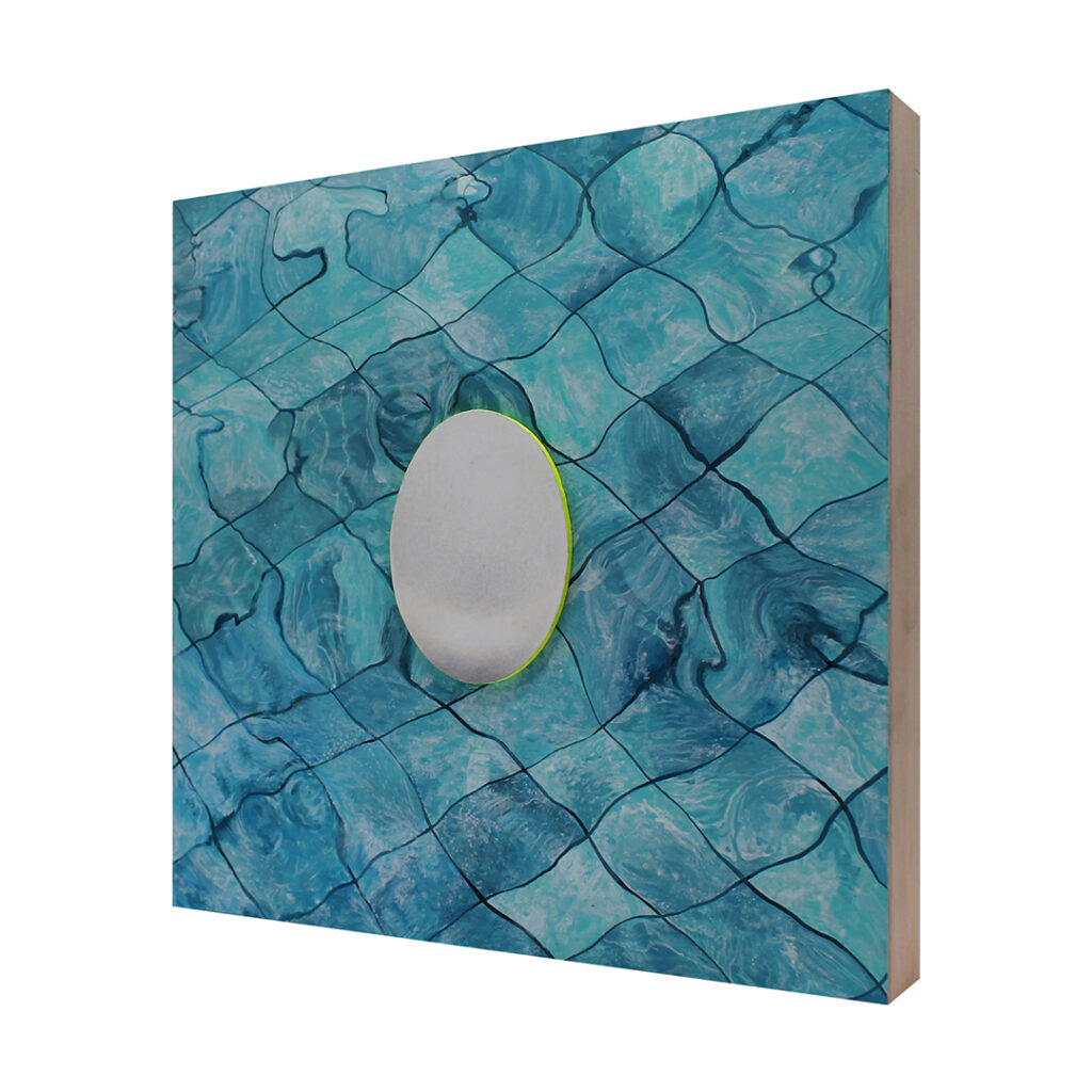 three dimensional artwork of an egg on tiles by Sarah Jamison